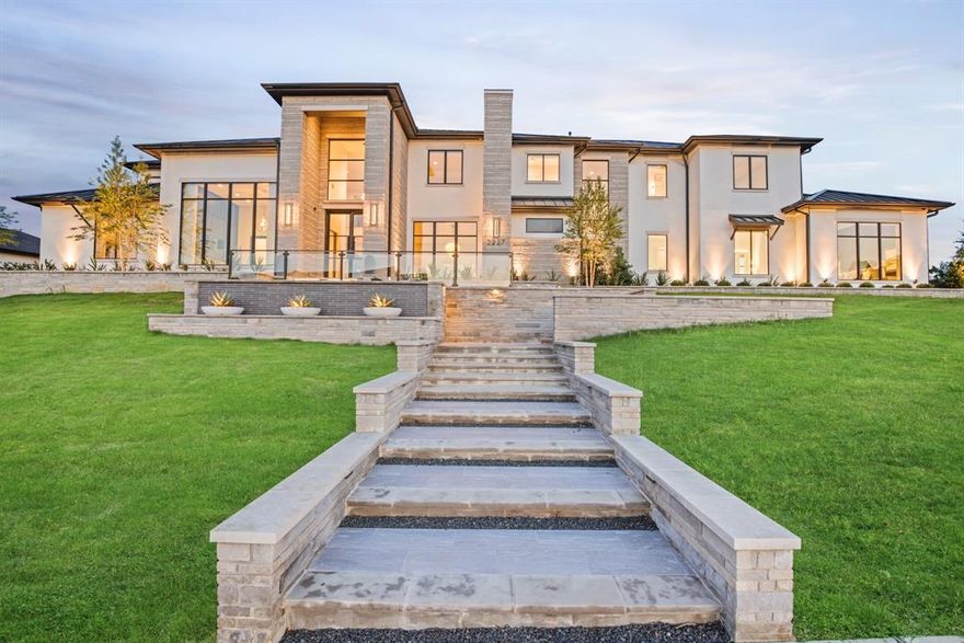 This luxurious .79-acre oasis within the prestigious Hills of Kingswood spans 10,266 sq ft of living, 6 bedrooms, 6 full baths, 3 half-baths. The transitional design blends sophistication with style; indoors, outdoors, & across the two homes. The main home features a downstairs private jr master suite w separate entrance. From custom millwork & high-end fixtures & finishes, every detail has been carefully curated. The gourmet kitchen features top appliances, large island w seating, & walk-in pantry & prep kitchen. The backyard includes a pool, hot tub, fire pit, sports court, outdoor kitchen, & lush landscaping. A 2,274 sq.ft. second home serves as a seamless extension of the main home w the privacy & utility of a separate guest house, cabana, & ultra-office. Other features include a 4-car garage, formal study, first-floor media room, game room, hotel-like exercise room, Control4 smart home system, whole-house hot water filtration system and custom 440-bottle wine room.