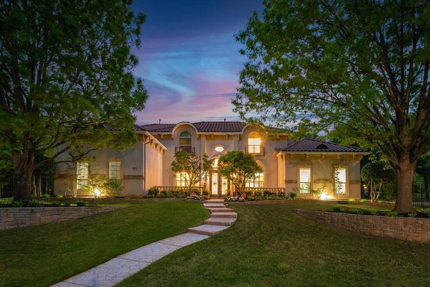 Step into this exceptional estate, nestled on a lush one-acre lot in the highly sought-after Southlake Woods, at the end of a peaceful cul-de-sac. A true entertainer’s dream, the outdoor living space is unrivaled, featuring a full outdoor kitchen, cabana, stunning pool, sport court, and an expansive backyard surrounded by mature trees.
Inside, the home exudes elegance and natural light, with a grand entry highlighted by a beautiful mosaic and a sweeping staircase. A private library and spacious formal living and dining rooms set the tone for sophisticated living. The luxurious master suite offers a serene retreat, complemented by an exquisite master bath. Generously sized bedrooms, each with walk-in closets, and additional living spaces upstairs, including a media room and gym, provide ample space for family and guests.
The heart of the home – the breakfast room, family room, and kitchen – seamlessly blend to create an inviting atmosphere perfect for both intimate gatherings and larger celebrations. The chef-inspired kitchen boasts granite countertops, custom Alder wood cabinetry, and stainless steel appliances. Rich hardwood floors, travertine, and custom finishes are woven throughout, creating a sense of timeless elegance.
Located in a community with fantastic amenities and just a short walk or bike ride to both elementary and high school campuses, this one-of-a-kind home offers unparalleled comfort and style.