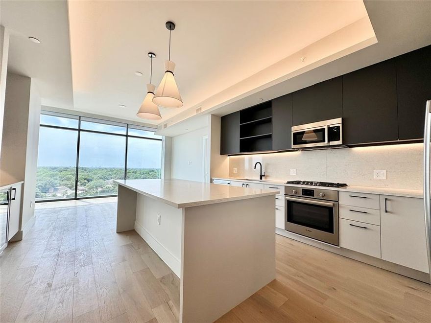 **BRAND NEW HIGH-RISE OFFERING HIGHLAND PARK ISD**
Step into one of our meticulously crafted residences and discover a sanctuary of unparalleled comfort. Floor-to-ceiling windows offer breathtaking views of the surrounding cityscape and flood each room with natural light, creating an ambiance of serenity and warmth. High-end finishes such as imported marble countertops, custom cabinetry, and state-of-the-art appliances elevate the standard of luxury living.
*Agent to verify Pricing and availability