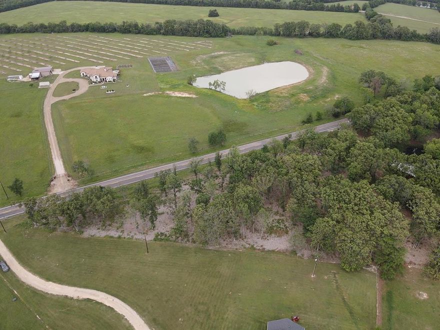 Discover this 2.7 acre residential building lot located about 10 minutes northeast of Paris, Texas. Situated in a highly desirable area, this property offers a peaceful setting with a selectively cleared landscape, preserving only mature hardwood trees that provide natural beauty and privacy. With a balance of open space and shaded surroundings, the lot offers excellent flexibility for your future build. Bring your building plans and create the custom home or private retreat you’ve been envisioning to this beautiful and well-situated tract.