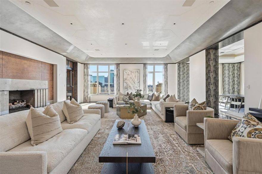 Captivating views of Dallas & exquisite details of pure luxury boasts throughout this 4 bedroom Ritz Carlton full floor Penthouse. Defined elegance, gracious living spaces, art lighting, gallery hall, marble ceilings, archways & wrap around balconies. A one of a kind Dallas address that encompasses it all with 5 star hotel amenities, including valet, room service, concierge, fitness center & full service spa; all within the heart of the city.