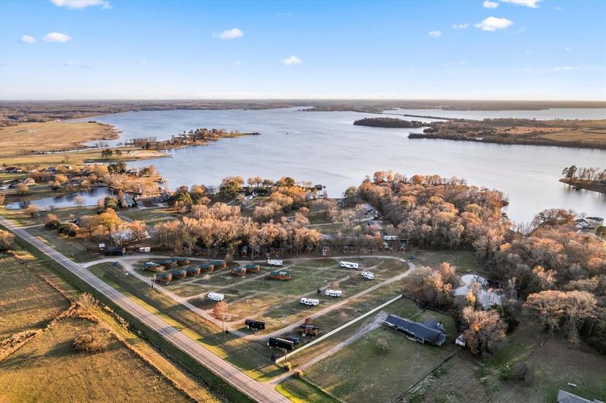 Discover an exceptional investment opportunity in this fully operational RV Park, strategically positioned just minutes from the serene Lake Bob Sandlin. This thoughtfully renovated property showcases 11 brand-new tiny homes, offering a unique blend of comfort and charm for guests seeking a lakeside retreat.

The park has undergone significant improvements, featuring newly paved roads and high-speed internet connectivity throughout the premises. Currently equipped with 66 full-service RV pads, the property holds untapped potential with space for an additional 14 pads, allowing for future expansion and increased revenue potential.

Guests can enjoy authentic outdoor experiences with the property's private fishing pond, while modern conveniences ensure a comfortable stay. The park features a practical on-site laundry facility with three washer and dryer units, a dedicated manager's office for smooth operations, and well-maintained guest facilities including a restroom and shower area.

This turnkey investment presents an ideal opportunity in the growing outdoor hospitality sector. The combination of existing amenities, recent upgrades, and room for expansion makes this property particularly attractive for investors looking to enter or expand their presence in the recreational property market. The proximity to Lake Bob Sandlin adds significant appeal for outdoor enthusiasts and vacation seekers, ensuring consistent visitor interest throughout the year.

Make your mark in the thriving recreational property market with this well-positioned RV Park, ready for its next chapter of success.