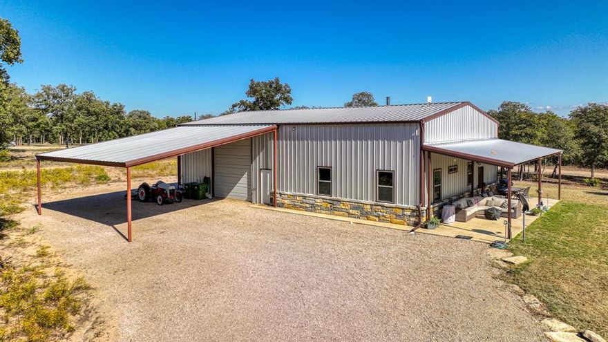 Motivated Seller! 3 Acres and like-new barndo just minutes from Weatherford.  This charming 3 bed 2 bath has it all! A dauntless flex burn wood burning stove, granite counter tops in kitchen, on breakfast bar, and bathrooms and newly epoxy floors.  Master Bedroom has 2 walk in closets with dual sinks. The 1400sqft attached shop has new epoxy floors, half bath, 12x14 roll-up door, 20x14 sliding door and an additional 800SF loft upstairs to make another living space, game room or extra storage. RV hook up and carport with room for 8 vehicles. Storage space in oversized well house. Huge porch over looks gorgeous Pasture to watch beautiful sunsets for the ultimate country setting. Seller offering $10,000 in seller concessions for buy down or closing costs.