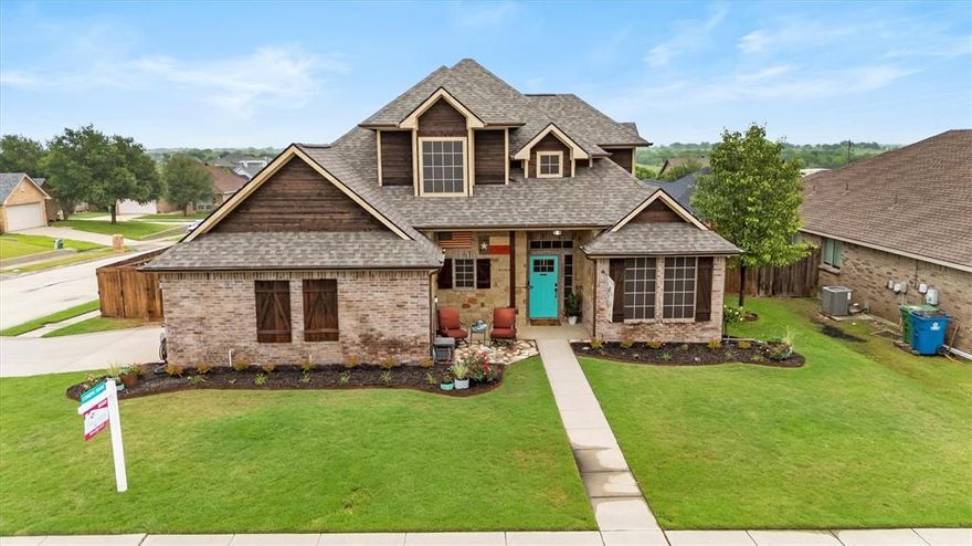 This beautiful two story home on a corner lot is fabulous!  The open floor plan, large kitchen and two dining areas are perfect for entertaining. Living room has vaulted ceilings, wood burning fireplace and hardwood floors.  Kitchen boast granite countertops, stainless steel appliances, butler pantry, and an additional walk in pantry.   Master is spacious with the EnSuite bathroom, granite countertop with dual sinks, jetted tub, seperate shower, and walk in closet. Upstairs is two additional bedrooms and a bath. Close to schools, I35, and Lake Ray Roberts. Sanger is a wonderful community to call home!