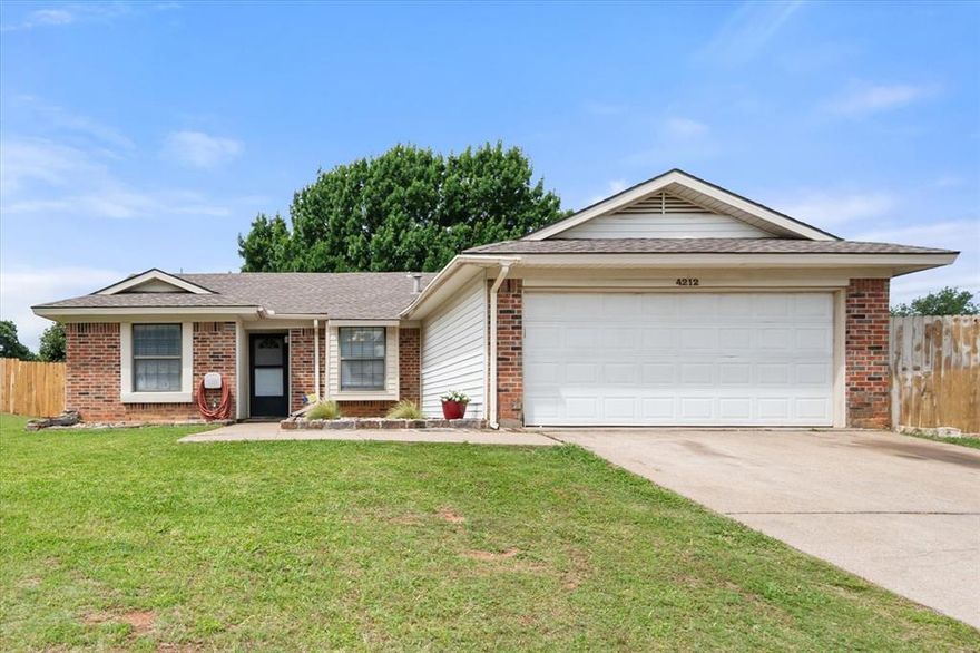 Great home and location right off IH 20 for easy access to either side of the DFW! Beautiful house, with lots of updates and extras. The house sits on a larger corner lot. The interior has an open floorplan with the Kitchen, living, and dining room at the heart of the home. Vaulted ceiling in the living room brings in tons of natural light. Great layout for entertaining and easy access to the back patio and large backyard for your backyard BBQs and kids to run and play. The building in backyard is well insulated with heat, AC, and electrical making the space perfect for your workshop space! The interior of the home has a split floorplan with the two additional bedrooms split from the primary bedroom. Recent updates include Fresh Paint, Fresh Carpet, master bathroom, fencing, and in 2021 all ducting and HVAC was replaced.  Great house, Great Location, Lots of updates, and all at a great price point! Come check it out!