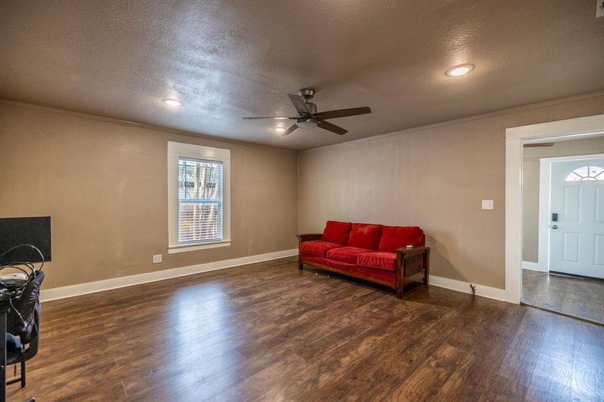 Wonderful renovated 3 bed 2 bath with a huge backyard! Interior offers multiple living areas, new flooring, kitchen, bathroom, and appliances. Home has brand new HVAC system and roof, and all new paint throughout the home. Fantastic location close distance to all schools and city park with quick access to major highways 67 and I-35. Huge gated backyard includes a deck and 3 storage sheds with a covered carport. This home is great!