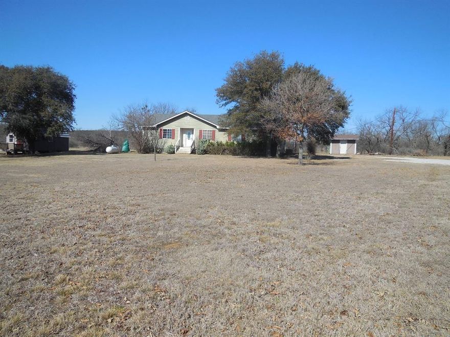 Great location located on the I-20 Access Road for a residence or commercial business. 2.348 acres for parking or building an additional commercial building. Live and work on the same property. The home has 3 bedrooms, 2 bathrooms, Open floor plan with a breakfast bar and dining area. There is a large approximately 490 square ft. screened porch on the back. The backyard is fenced in with a storage building. There is an extra storage building and a larger building with electricity that could be used for an office or workshop. Next to the airport, college, and interstate makes this a very 
diverse property. Call today for your personal tour.