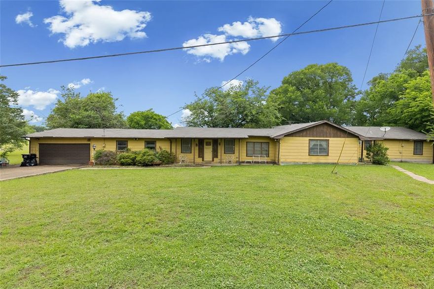 Investment opportunity on TWO lake-front lots** Wanting a weekend lake retreat or everyday lake-front home? This spacious home is perfect for any and all renovation ideas. The home features 4 bedrooms, 2 full baths, 3 living areas, and built in dry bar. The attached, 2-car garage has 3 additional storage rooms. Ample space to bring your projects and hobbies. Cul-de-sac neighborhood and an approximated 150 ft fishing dock with beautiful lake views. Sold AS-IS**