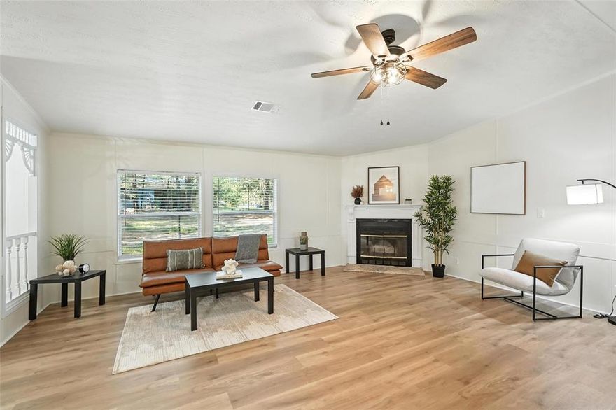 Just minutes from Lake Palestine! This spacious property is just waiting for it's new owner! Fresh paint, new flooring, new fixtures and new appliances! Sitting on 0.895 acre, you have all the space you need and so many shade trees! This 3 bedroom, 2 bath is bright and open with a huge living area featuring a wood burning glass front fireplace. Large kitchen for those family gatherings. Breakfast bar is open to the living area. Large utility room with entry from the patio and parking area. Large workshop or game room is waiting for your imagination! It features a half bath and is on it's own separate septic system and water meter. Could also be completed to create a rental space for additional income. The main house is also on a separate septic and water meter. The huge front yard with plenty of trees for shade. Create your own paradise here! Seller is a licensed Texas REALTOR. DO NOT CHANGE TITLE COMPANY.