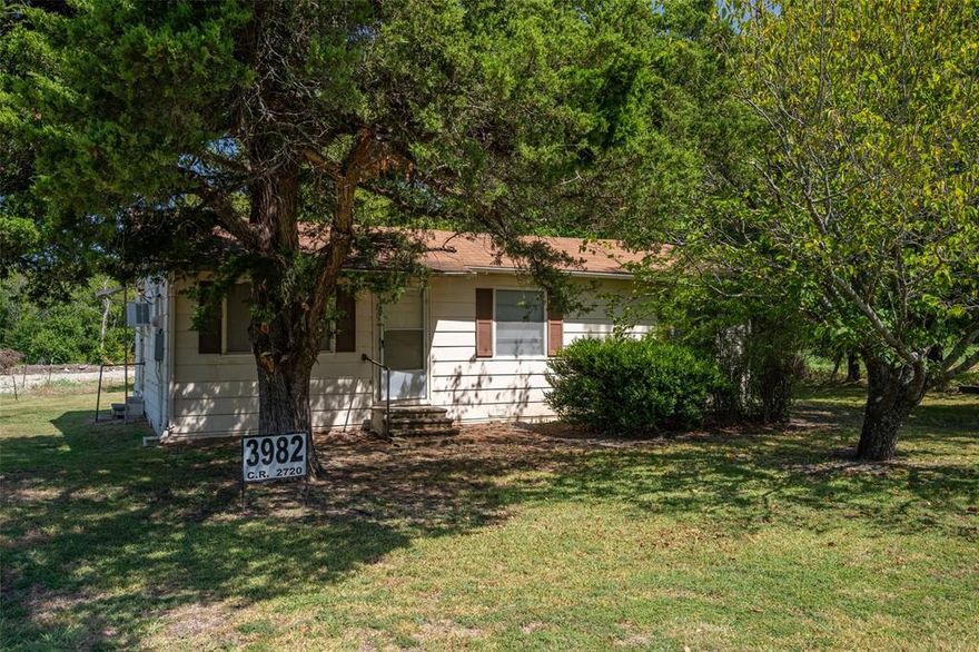 2 ACRES-3982 CR 2720. CORNER OF FM 36 & CR 2720. LOCATION! LOCATION!  PROPERTY HAS FRONTAGE ON 2 ROADS. ENDLESS POSSIBILITIES WITH THIS PROPERTY. QUICK ACCESS TO  MAJOR ROADS FM 36,  HWY 66 , FM 3211, AND HWY 380. IF  YOU'RE LOOKING TO REMODEL AN OLDER HOME OR BUILD A NEW HOME OR NEED A COMMERCIAL SPOT FOR YOUR BUSINESS THIS IS IT.  HAS AN OLDER  3 BEDROOM, 1 BATH HOME  NEEDS  TLC AND  METAL DETACHED 2 CAR GARAGE, AND A STORAGE BLDG. WILL REQUIRE A NEW SEPTIC SYSTEM. PROPERTY HAS SCATTERED BIG TREES &  POND.  COME ON AND LOOK!