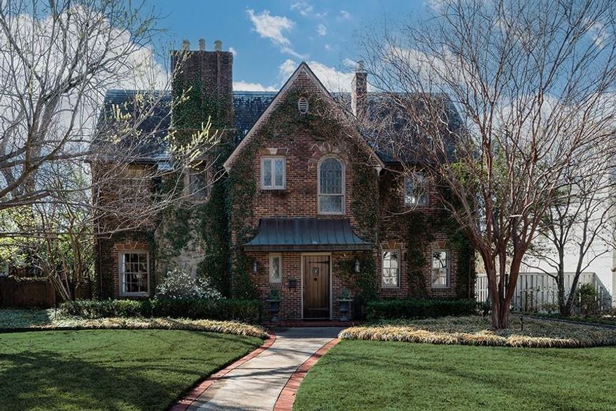 Still true to it's original charm, this home is one of the most architecturally beautiful English Tudors in Greenway Parks with its storybook façade. Once inside, a distinctive and enchanting living room lets you know this is a special one.  The living spaces are further enhanced by the timeless wood    paneled den featuring a handsome fireplace with French doors overlooking the landscaped back yard.  Even the staircase is a treasure, and the period stained glass and rich window treatments add to the intrigue.  A 2-car garage includes a guest suite above and also has slate roofing.  The expansive 80x166 lot lends itself to future expansion or addition of a swimming pool.  Don't miss this rare find!