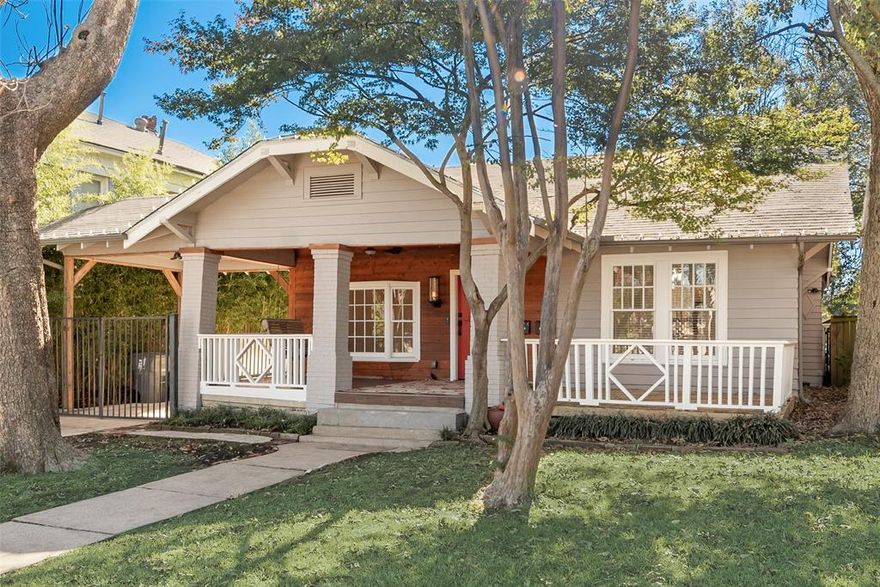 Prime Location Near Greenville Avenue.  Discover this charming Craftsman-style home just steps from Greenville Avenue’s vibrant restaurants and shopping. This recently remodeled property offers three bedrooms and two bathrooms, with bamboo flooring throughout and ceramic tile in the baths. The inviting front porch with a swing sets the tone for cozy living, while the updated kitchen features quartz countertops and premium stainless steel appliances, including refrigerator, gas range, dishwasher, and microwave. A full-size washer and dryer are included for convenience. Outside, enjoy a private backyard with artificial turf, cedar deck, extra parking, and an EV fast charger.  Fully floored attic for storage.  Lawncare included!  Located just minutes from White Rock Lake, this home combines character with modern upgrades in one of Dallas’s most desirable neighborhoods.