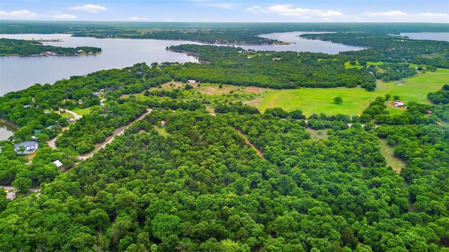 Discover the potential of this scenic property in Bowie, Texas, just a short drive from Lake Amon G. Carter. Offering a beautiful mix of mature trees and rolling topography, this land provides perfect setting for a future homesite, weekend retreat, hunting or investment opportunity. The property includes a livable mobile home; however it is being sold as-is, with value placed on the land only. Electricity is present but will require replacement, making this an ideal project for those looking to customize utilities to their needs. Partially fenced and rich with natural character, this property offers privacy, flexibility, and plenty of room to create your vision. Enjoy country living with convenient access to nearby recreation, fishing, and outdoor activities.
