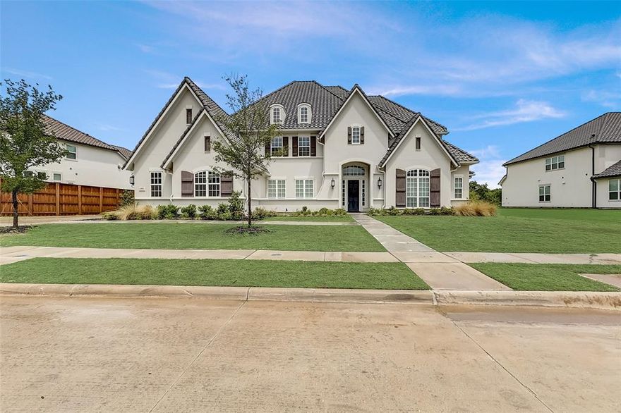 **$100,000 price reduction!**Showstopper!! Custom built 5 bedroom, 5.5 bath Toll Brother's model home is ready for you to show off! You'll instantly fall in love the moment you enter this grand estate! Gourmet kitchen is one to be admired! Oversized island, prep kitchen, multiple pantries, state of the art built-in appliances, 2 dishwashers, 2 ice makers, and ample seating area. Formal dining room with veranda. Two enviable primary bedroom suites filled with luxury you will want to share with your overnight guests! The many unique features throughout that you will appreciate include a dueling staircase, smart wiring for all your tech needs, two primary suites, remote controlled black out shades, wood plank floors, BEAM vacuum system, and so much more. This house is built to entertain! Lots of outdoor living and entertaining space includes fireplace, fire pit, outdoor kitchen, and beautiful landscaping. Don't miss out on this elegant and rare gem! 3D Tour available online.