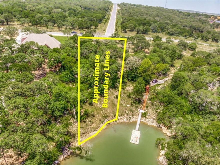 Discover this exceptional 1-acre lot backing up to the pristine Lake Bridgeport, located in the desirable North Star Pointe subdivision. With over 97 feet of waterfront, this property offers breathtaking views and a tranquil atmosphere surrounded by lush trees and striking native boulders. Enjoy direct access to a variety of recreational activities, including wakeboarding, skiing, and fishing on the expansive lake. The lot is conveniently situated near the community boat ramp and is just a short walk to the community pool, making it ideal for relaxation and outdoor fun. This property also allows for the possibility of a private boat dock with approval, perfect for boating enthusiasts. Don’t miss this rare opportunity to own a slice of paradise in a beautiful, gated community. Embrace the lifestyle you’ve always dreamed of!
