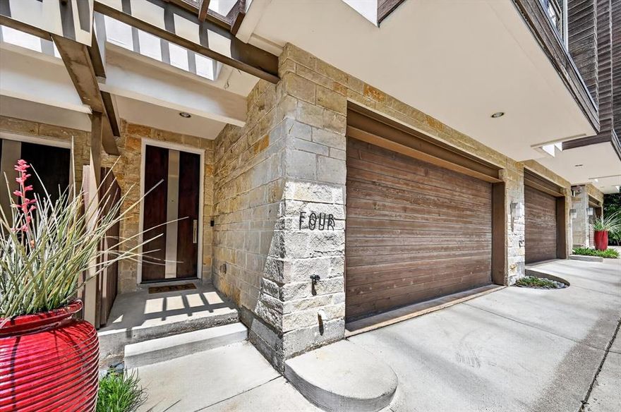 Stunning three-story townhome at 4230 Travis St #4 in a premier, walkable location near Katy Trail, Uptown, and top dining and entertainment. Featuring a striking steel floating staircase, soaring ceilings, and hand-finished oak hardwoods, the light-filled second floor offers an open living space and chef’s kitchen with European cabinetry, plus a private patio and powder bath. The first floor includes a guest bedroom and full bath with polished concrete floors and access to a fenced, turfed backyard with patio. The third-floor primary suite features a spa-like bath with dual sinks, soaking tub, walk-in shower, and an oversized custom closet, along with a private office. Additional highlights include a two-car garage, multiple outdoor spaces, hidden storage, and a stylish, swanky design throughout.