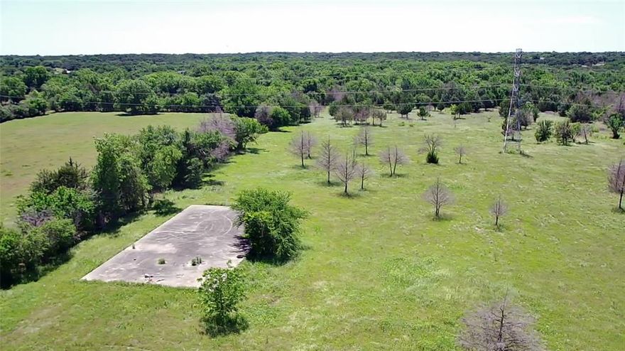 Price Improvement! Introducing 18 acres of C-2 commercial land in the thriving city of Cleburne. 324ft of frontage on Moore Rd. Easily converted to Resi for a beautiful homestead. Path of Growth - Future Development. Located of Hwy 67. City water and sewer on property. 5,000 sq ft slab. Electricity available at the road. Seller does have existing survey. Buyer and Buyers agent to verify all information provided. Front of the property is in the X flood zone and Backside of the property is flood zone A. 2 parcels combined to make 18 acres. Seller Financing Available.