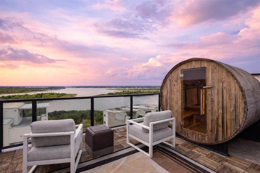 Experience elevated living in this stunning 4-story luxury corner townhome, thoughtfully designed to combine modern architecture, advanced technology, + resort-style amenities. Showcasing panoramic lake views + a true rooftop oasis, this newer construction home is finished with 5-inch wide plank real oak hardwood flooring throughout every level.
Enjoy complete control at your fingertips with a fully integrated smart home system. Whole-home audio, video, lighting, and motorized blinds are all operable through the RTI app, with speakers integrated throughout every room, bathroom, and hallway. All lighting is outfitted with Lutron dimming switches,+ every window features custom Hunter Douglas motorized shades.
The rooftop patio is a true showstopper—designed for year-round enjoyment + entertaining. This expansive space features custom flooring, a built-in Coyote grill, outdoor refrigerator and sink, two zones of outdoor speakers with a subwoofer, a full sauna,+ motorized UV shades enclosing all sides of the pergola for comfort in any season. Inside, the living room is an entertainer’s dream, anchored by a custom wet bar w ice maker, beverage refrigerator, dual-zone wine cooler, glass shelving, + custom tile backsplash.
The chef’s kitchen is equally impressive, featuring a professional Thermador appliance package including a 48” six-burner range w griddle, steam + convection ovens, warming drawer, + commercial-grade hood. A dramatic waterfall quartz island w hidden storage serves as the focal point, complemented by a butcher block prep island. All kitchen + bathroom cabinetry is Milania soft-close, reflecting exceptional craftsmanship throughout. Spa-inspired bathrooms elevate daily living, each appointed with floating Milania vanities + vessel sinks. The primary suite offers a private retreat wman oversized custom glass steam shower, delivering a true spa-like experience at home.
This exceptional residence effortlessly blends luxury, technology, + lifestyle.
