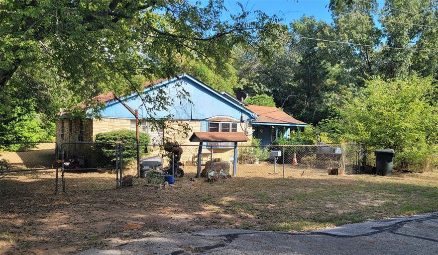 tLooking for an investment opportunity?  This is it. Four beedrooms, two baths with lots of potential.