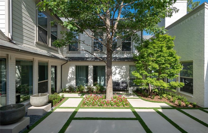 From the gated courtyard to the beautiful backyard oasis, this home is an entertainers delight.  Interior Designers personal home so every inch has not only been updated but special touches added. Features include 5 bedrooms (two down and 3 up) each with an en suite bath with unique touches and large closets. So much storage in this home. The primary suite has HIS and HER separate baths and a beautiful sitting area overlooking the courtyard.  From the floor to celing marble fireplace to the white oak wood flooring , this is truly a retreat. LA, gameroom and study all have vaulted ceilings. KITCHEN is one of a kind with double islands wrapped in Rift cut white oak, Subzero full size freezer and fridge, Viking range, JennAir appliances including a Steam oven and a coffee station area that is plumbed. The wet bar is centrally located with wine fridge, scotsman icemaker and custom wine storage. Electronic LUTRON SHADES on windows facing courtyard.  3 car, Tankless water heater, etc