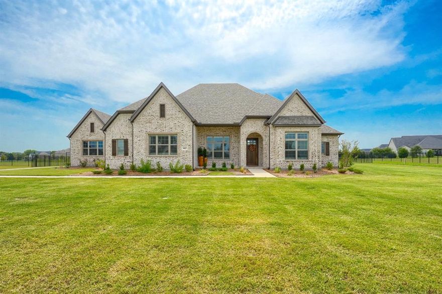 Welcome to a rare opportunity: One-year-old Drees masterpiece on a highly sought after lot, where luxury meets livability. From the moment you enter, the craftsmanship and attention to detail are unmistakable. Warm alder cabinetry, hand-laid designer tile, and gleaming hardwoods create a sophisticated yet inviting backdrop. Every bedroom is a private retreat with its own en-suite bathroom, and the versatile office offers the option of a fifth bedroom. The primary suite is a sanctuary, featuring a spa inspired bath and a thoughtfully upgraded walk-in closet that elevates everyday living. Designed for both grand entertaining and intimate gatherings, the chef’s kitchen showcases a massive island, a huge butler’s pantry, and seamless connection to the living area. A wall of heavy-duty sliding glass doors opens across the back, blurring the line between indoor comfort and outdoor enjoyment. The functional side of luxury shines with a ginormous laundry room, abundant cabinet storage, and thoughtful upgrades throughout. Outside, the home is framed by five newly planted trees, adding natural beauty and future shade to this prime setting. This property is more than a home. it is an expression of modern elegance, built with integrity and designed for the way you want to live today.