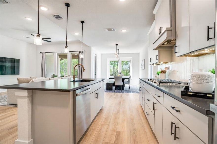 Some homes are built. This one was curated — and it shows the moment you walk through the door.

Nestled on a lush greenbelt lot in sought-after Painted Tree, this east-facing home feels better than new, with thoughtful upgrades around every corner. A private office with glass French doors sets the tone. The living room glows with flush-mount LED lighting, flowing seamlessly into a stunning open-concept kitchen featuring marble-look quartz countertops, upgraded cabinetry, champagne bronze fixtures, a large granite composite single-bowl sink, a 5-burner gas cooktop under a Cambridge Wood Hood, and a charming box window in the dining nook. Downstairs also includes a half bath, laundry room, and built-in cubbies right off the garage — because everyday life should be effortless.

The primary suite is your escape — bay window, spa-like bath with a large walk-in shower, double sinks, and a walk-in closet that won't disappoint.

Head upstairs to a massive game room, an oversized media room pre-wired for 5.1 surround sound and flat-screen viewing, and three generous bedrooms, each with a walk-in closet — one complete with its own ensuite. The second full bath features double sinks and a private water closet.

Out back, a covered patio with a gas stub overlooks serene green space through a wrought iron fence — your blank canvas for outdoor living. The 2-car garage is EV-ready, and front uplights plus holiday-light outlets in the eaves make this home shine year-round.

8-foot interior doors. East-facing light. Greenbelt privacy.

Come see it — you won't want to leave.
Ask about the exclusive lender incentive offered, a 1-0 buydown paid by lender