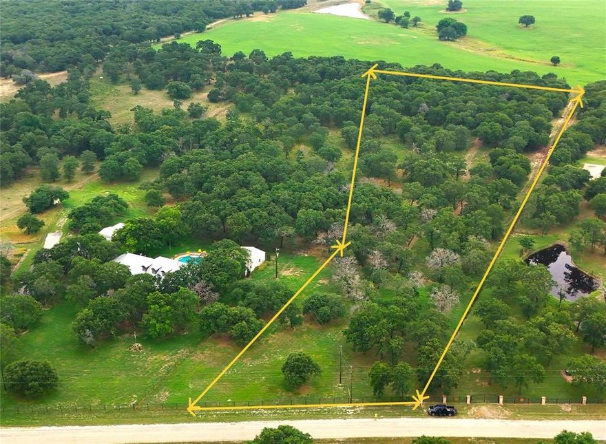 Create your ideal retreat on this stunning 5-acre homesite! Nestled among beautiful trees, this property offers privacy, open space, and the true Texas lifestyle. Bring your horses and design the home you’ve always envisioned. The lot measures 176.32 feet wide at the front and expands to 240.65 feet at the back, providing even more room to enjoy.