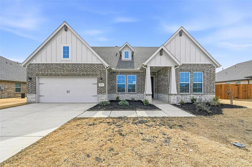 Step into this exceptional 4-bedroom, 3-bath home with a 2-car garage, thoughtfully designed for both everyday living and entertaining. An oversized front door opens to an elegant entry and an open split-concept layout, with chic wood tile flooring flowing through the main living areas. A private study with double doors offers flexibility for work or hobbies. The gourmet kitchen is the centerpiece of the home, featuring an oversized island and a spacious walk-in pantry, seamlessly connecting to the expansive living room anchored by a warm wood-burning fireplace. Generously sized secondary bedrooms and two additional baths provide comfort and space for all. The primary suite is a true retreat, complete with dual sinks, a garden tub, and a separate shower. Enjoy the covered back patio and a fully irrigated backyard with no rear neighbors—perfect for peaceful outdoor living.