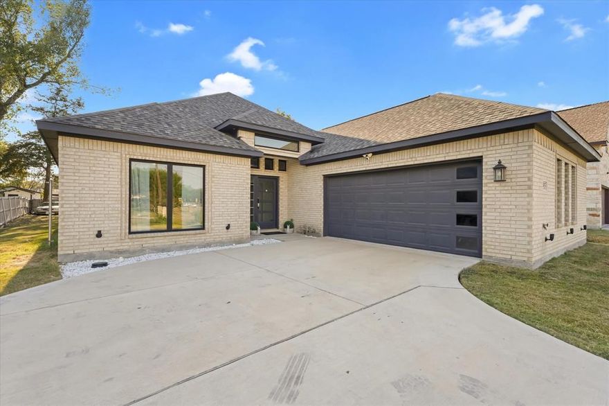 Welcome to 2915 Ames Road in Lancaster, TX, a beautifully designed modern home built in 2022 that blends comfort, style, and functionality. This spacious two-story residence offers 4 bedrooms, 3.5 bathrooms, and two inviting living areas, one on each level. The upstairs living room includes its own half bath, making it an ideal retreat for guests or a cozy entertainment space.

Step inside to a welcoming foyer that opens into a bright, open concept layout. The kitchen is a true showstopper, featuring an island with elegant quartz countertops, sleek cabinetry, and a seamless view of the main living area, perfect for gatherings and family moments around the fireplace.

Throughout the home, you’ll find upgrades that add both beauty and durability, including porcelain tile installed within the last two years and luxury vinyl plank flooring in the bathrooms. Each detail has been thoughtfully chosen to create a space that feels both modern and warm.

Outside, enjoy a covered patio perfect for relaxing evenings or weekend barbecues. The home’s extended driveway provides ample parking, while the clean modern exterior design gives it great curb appeal. With no HOA, you’ll have the freedom to truly enjoy your home