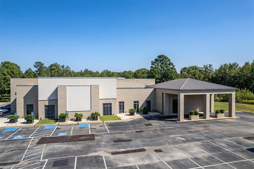 The Summit Club is a 17,000 square foot commercial property located in Longview, Texas, featuring a well appointed interior with multiple office suites, a spacious dining and reception area, a fully equipped commercial kitchen, a welcoming member lobby, a lounge, and several storage rooms. Currently operating as a private membership venue, the property is ideal for hosting weddings, corporate functions, and various social events. It sits on a 2 acre lot with ample parking for guests or staff, and there's potential to purchase additional adjoining acreage for future development. With its versatile layout, the building can continue to serve as an event venue or be repurposed for alternative commercial uses such as medical offices, professional workspaces, retail establishments, a fitness center, or more. Conveniently situated near downtown Longview, the property offers easy access to major roadways and local amenities. An additional 30 acres of surrounding land is also available for purchase, presenting a unique opportunity for expansion or large scale development.