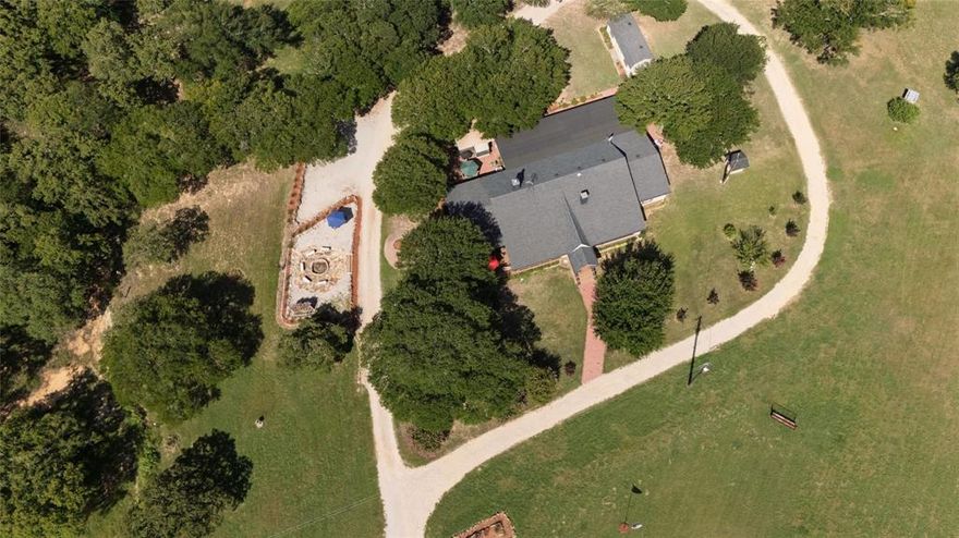 Welcome to the Wildwood Canyon Ranch, a scenic AG-Exempt, tranquil property, nestled in the breathtaking North Texas Hill
Country which offers something for everyone. The terrain boasts hills, a valley area, natural rock formations, open
pasture, hardwoods, and includes two multi-acre lakes. Both lakes are stocked with a wide variety of fish, including
Florida strain largemouth bass. The spacious home includes 3 bedrooms, 2.5 baths, 2 pantries, 2 water heaters, 2
living rooms, an office, a game room, a reading room, a formal dining room, eat-in kitchen, a screened-in porch, multiple
patios, and a shop with a covered area for equipment storage. This meticulously maintained, 4,000+ sq ft home, is
dually suited for quiet relaxation as well as entertaining family, friends, or business contacts. The nearly 75 acres is
teeming with wildlife. Deer, geese and turkey are only a few examples of the animals that can be seen while enjoying
the property. This quality of property is rarely found on the market. Come experience God's natural glory that Wildwood
Canyon Ranch has to offer