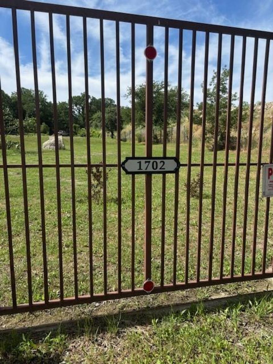 Rare gem one acre residential lot, cleared and ready to build on in a fast-appreciating area. Nestled in a historic neighborhood where families walk to school. Elementary school is a fine arts and Vanguard facility.  A quiet historic pocket with a strong sense of community.  Centrally located with quick and easy access to downtown Dallas and major highways. Property is in close proximity to trendy Bishop Arts, scenic walks at Kessler Park and the  future Harold Simmons Park to be completed in 2026.  Land is cleared, private and ready to build on. Utilities at the street. Property is fenced and accented with many fruit trees.