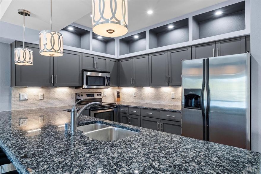 Experience stylish urban living in this beautifully renovated 1-bedroom, 1-bath condo in the heart of Dallas! Perfect for young professionals or those seeking a low-maintenance lifestyle, this top-floor unit blends comfort and sophistication with wood floors, granite countertops, and sleek under-cabinet lighting.

Located in a gated community, you’ll love the resort-style amenities including a sparkling pool, modern fitness center, and a lush courtyard with shaded lounging areas and an outdoor kitchen — ideal for entertaining or relaxing weekends at home. The unit features washer and dryer hookups, and with the right offer, furnishings, refrigerator, washer, and dryer can convey for a true move-in-ready experience. 

Some HOA amenities are as follows:  
Laundry facility, Fitness center, Private pool, Grilling stations, Designated pet area, Clubhouse available for reserved, private parties, Community business center in lobby with desktop for internet & printer access, Package delivery area in lobby for added security, 24-hour surveillance (51 cameras), Fob & code required for accessing property & premises, Covered parking in community garage on ground level, Parking spaces deeded with sale of unit (owners own their parking spaces), Premises maintained by porter service (3x per week), Property maintained by landscaping service (1x per week), Pool maintained by pool cleaning service, Property managed by on-site community manager (5 days per week), Limited concierge services offered by on-site manager, exterior insurance covered by HOA 

Whether you’re buying or leasing, this condo offers the perfect blend of convenience, comfort, location and city living — all just steps from Dallas' dining, shopping, nightlife and many colleges & universities including UT Southwestern Medical Center! 

**All information is deemed reliable, but buyer and buyer's agent to verify. Unit can be leased, fully furnished. Just contact one of the listing agents for details.**