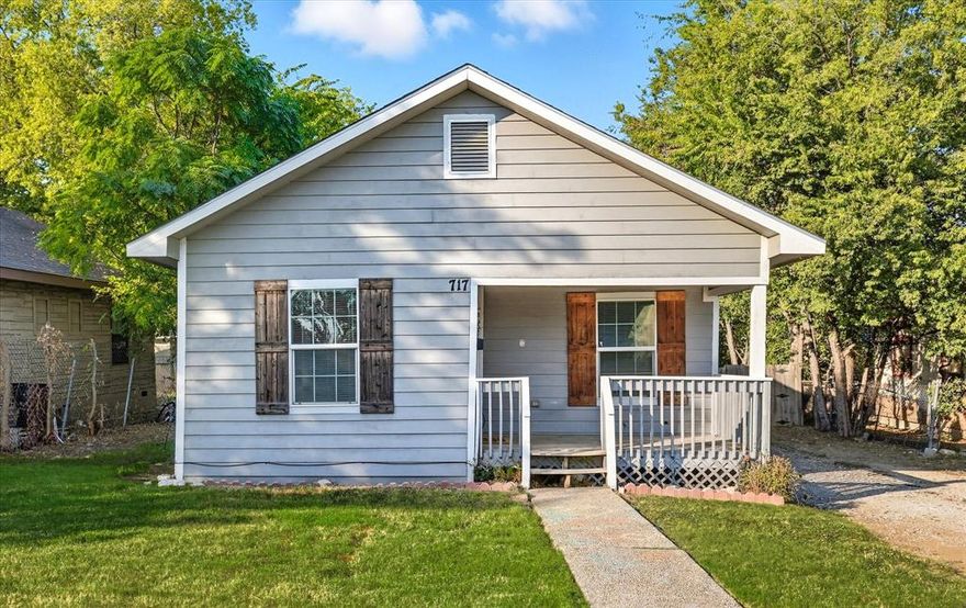 Welcome to this beautifully remodeled home, featuring thoughtful updates throughout! Every major system has been renewed, including electrical, plumbing, roofing, HVAC, water heater, and more, ensuring peace of mind and modern comfort.

Enjoy the luxury of ample parking, with a gated entry fence to the backyard for additional space and security. A charming covered front porch sets the tone, perfect for morning coffee or evening relaxation. Step inside to an open-concept living space featuring a spacious living room, dining area, and kitchen, complete with a full-size washer and dryer area discreetly enclosed for convenience.

From the kitchen, access the covered back patio that overlooks a large backyard with endless possibilities, ideal for entertaining, gardening, or play. The home offers two generously sized bedrooms and a full bath, giving you both comfort and function.

Perfectly located near I-35W and I-30, just 5 minutes from Downtown Fort Worth and zoned to the highly desirable Paschal High School. This move-in ready home combines updates, location, and charm all in one. All that’s left is for you to make it your own!