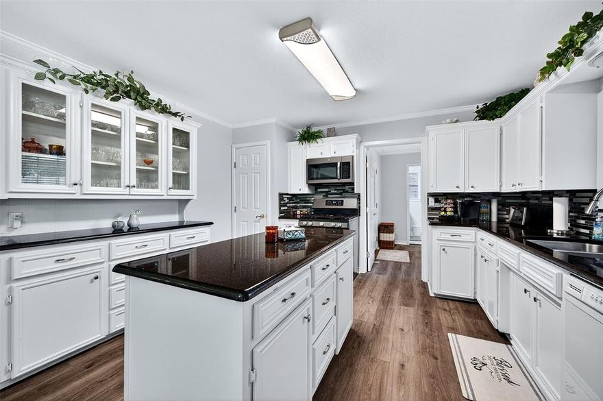 I am excited to tell you about a beautiful showplace that has been completely remodeled and is now on the market. From the moment you step inside, you'll be greeted bay an open-concept living space that immediately feels like home. This property features two large bedrooms and two full bathrooms, both of which have been entirely renovated to create a spa-like experience with stunning quartz countertops and custom finishes. The wonderful kitchen is a true highlight, boasting and island, abundant storage, and an updated gas stove. A well-organized pantry provides additional space for all your needs.
The home offers a spacious living room and cozy den, perfect for relaxation. As an added bonus, there is a private, heated and cooled office located in the back, ideal for those who work from home or need a dedicated space for hobbies. 
This home reflects the immense care and hard work the owner has invested in it. I highly recommend being among the first to experience this truly loved property.