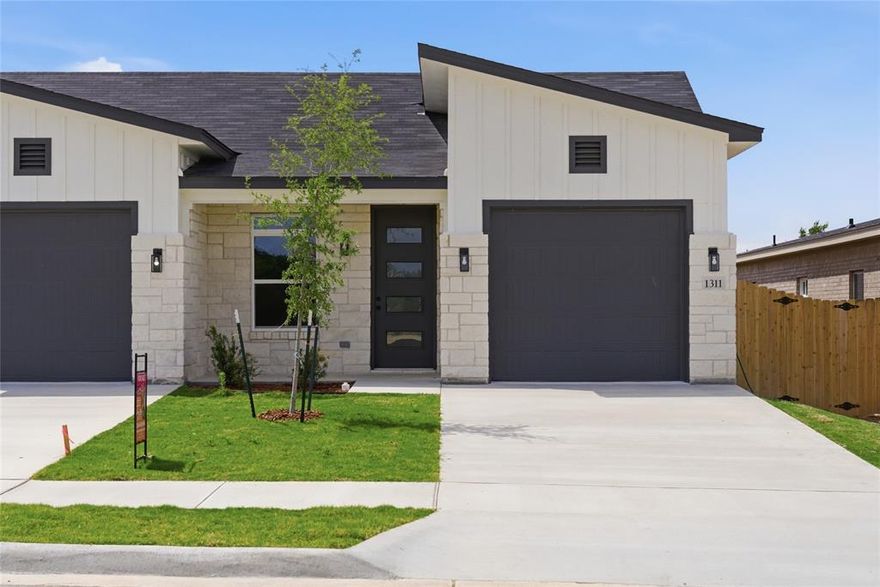 New Townhome Construction by BFF Construction LLC — Now Selling in Killeen! Be part of Killeen’s newest townhome
community! This modern 3-bedroom, 2-bath townhome offers stylish design, contemporary amenities, and energy-efficient
features. Designed for both everyday living and entertaining, the open-concept layout welcomes you with a stunning electric
fireplace and seamless sight lines into the dining and kitchen areas. LVP flooring, recessed lighting, and ceiling fans are
installed throughout, with pop-up ceilings adding architectural interest and an elevated feel. The kitchen features granite
countertops, a stainless steel appliance package, and sleek modern finishes. The private backyard includes a covered porch,
full fencing, and full sod — perfect for relaxing or hosting. A 1-car garage adds convenience and additional storage. The
primary suite is thoughtfully designed with a pop-up ceiling, double vanity, large walk-in shower, and spacious walk-in closet.
Centrally located near shopping, restaurants, medical facilities, and schools, and just minutes from Fort Hood with a short
drive to Harker Heights, Belton, and Temple. up to 1% lender credit when using the builder’s preferred lender. Incentives are subject to change without notice.
Get in now before they’re all sold!