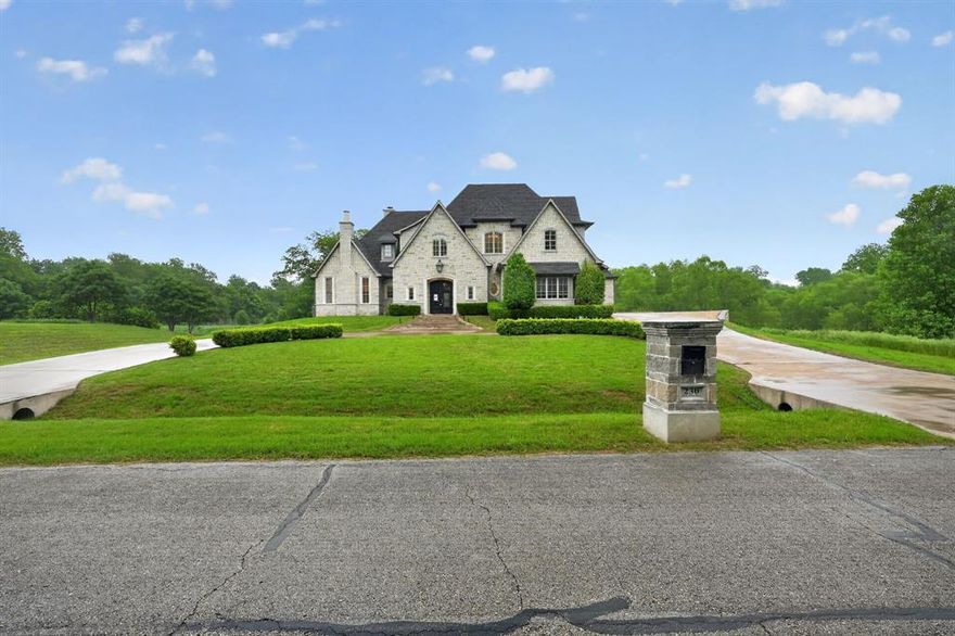 Elevated design and scale come together at 230 Oak Tree Dr, set on an expansive homesite in Waxahachie. This 4-bedroom, 3.5-bath residence with a 2-car attached garage offers a refined multi-living layout with formal dining and open gathering spaces. The kitchen is outfitted with granite counters, a large island, gas cooktop, and walk-in pantry. The primary suite features dual vanities, a separate shower, and generous closet space. Vaulted ceilings, decorative lighting, and multiple fireplaces add architectural detail throughout. Outdoor features include a covered patio, sprinkler system, and a spacious yard. Convenient access to Hwy 287 and I-35E, near Lake Waxahachie, Getzendaner Park, Waxahachie Sports Complex, and local retail and dining.