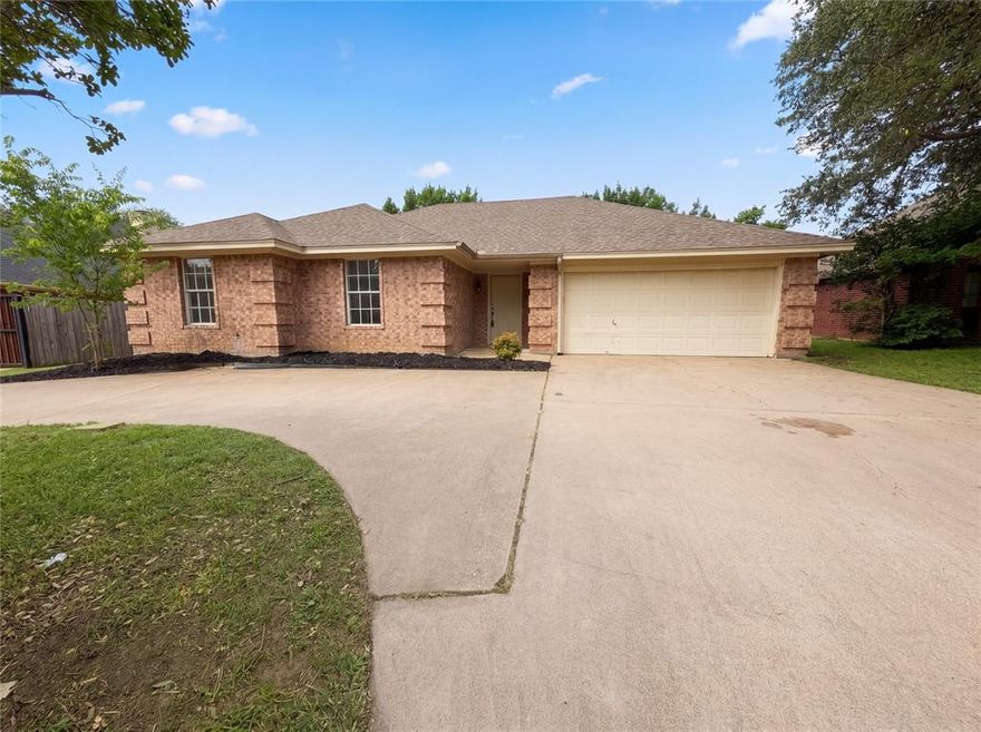 Meet the updated residence at 1233 Windy Meadows Dr, showcasing fresh interior paint throughout. The interior includes a cozy fireplace, and the kitchen features all stainless steel appliances. Outside, a covered patio provides access to a fully fenced in backyard. This home is a perfect blend of style and functionality, making it a must-see. Home comes with a 100-Day Home Warranty and a 7-Day Home Test Drive to move in 7 days early for free