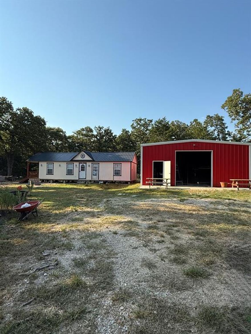 **Manufactured Homes allowed. NO RESTRICTIONS ** Nestled on 7.13 serene acres, this beautiful piece of land offers the perfect blend of open space and natural privacy. As you enter the property, you'll be greeted by a cleared-out entrance that opens up into a peaceful, wooded area, offering both accessibility and seclusion.
A charming pond adds a touch of country tranquility, perfect for enjoying quiet mornings or sunset views. The property includes a brand-new mobile home (interior unfinished – ready for your personal touch), and a spacious shop with electricity that could easily be transformed into your dream barndominium, workshop, or creative space.
With no restrictions, the possibilities are endless. Whether you're looking to build your forever home, create a peaceful weekend retreat, or develop a unique investment property. All utilities are available, making the transition from vision to reality even easier.