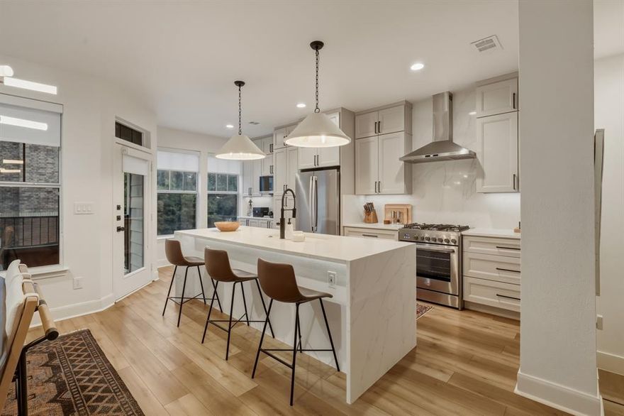 Stylish 3-story townhome-style condo in the heart of Old East Dallas, adjacent to the historic Swiss Avenue Historic District. This light-filled home features a dramatic 2-story living room with a gas fireplace and designer tile surround, creating an inviting space for entertaining and everyday living.
The updated eat-in kitchen offers stainless steel appliances, ample storage, and hardwood floors throughout the main living areas. A first-floor bedroom with a full ensuite bath provides the perfect setup for guests, a home office, or multigenerational living.The third-floor study features a full wall of built-ins and a charming Juliet balcony overlooking the living room below. The spacious primary suite includes a spa-inspired bath with a jetted tub, separate tiled shower, and generous closet space. Additional highlights include crown molding, ceiling fans, and a covered balcony for outdoor enjoyment. Ideally located just minutes from Downtown Dallas, Lower Greenville, Lakewood, and West Village, with some of Dallas’ best shopping, dining, and entertainment just around the corner.