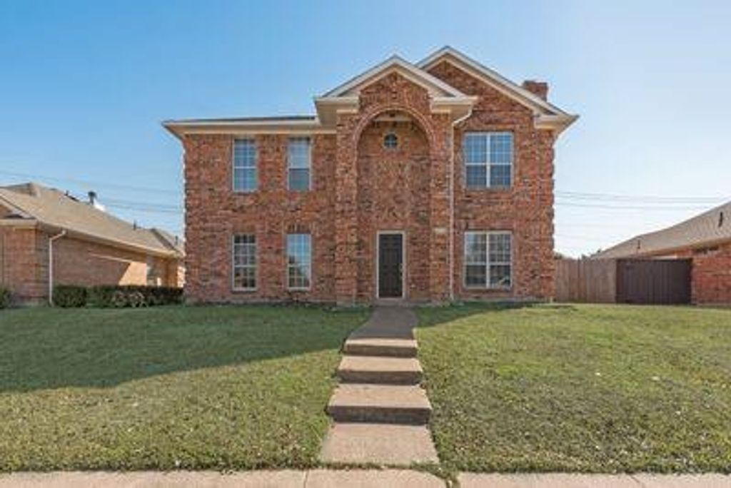 Photo of 9406 Chimneywood Drive, Rowlett, TX 75089 (MLS # 21194203)