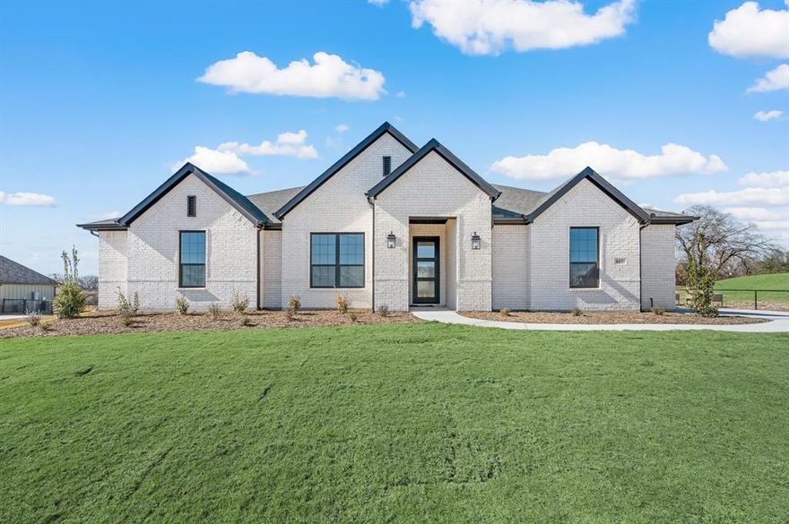 This is a great family home with 4 bedrooms, 2 full baths, 2 car garage. Wide open floor plan with great room, dining and kitchen that overlooks the massive back yard. Real hardwood floors throughout living, kitchen and dining area. Great brand-new floor plan that is getting rave reviews. The community Rocky Top Ranch is a new community in Reno, Texas offering luxury and peaceful serenity. Enjoy a small-town atmosphere and wide-open space. Rocky Top offers large 1+ acre lots. This scenic community features beautiful hilltop views and stunning sunsets. With convenient access to Eagle Mountain Lake, Springtown, Azle, Lake Worth, and Boyd, you’ll experience Reno’s rural charm while having city amenities nearby.