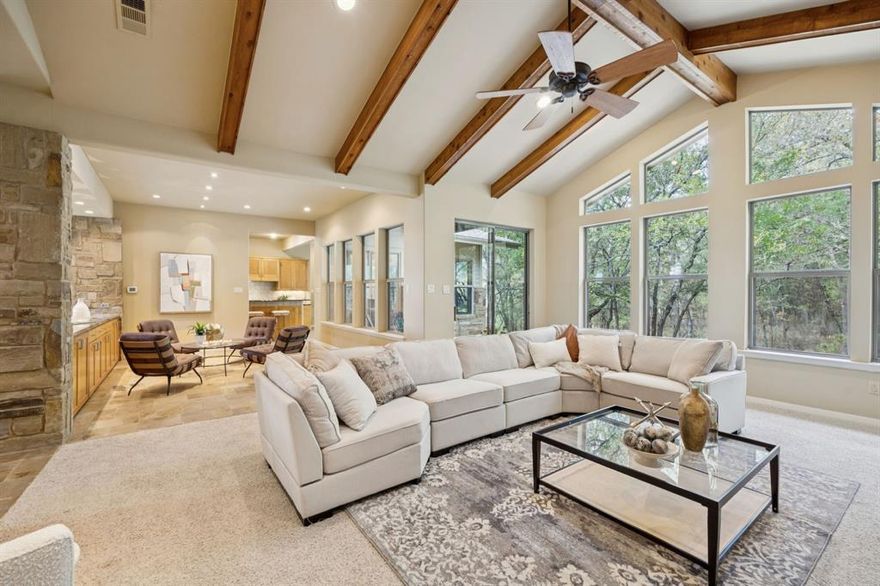 Wake to fish rippling the water’s surface and end your day watching geese drift across a painted sky. Within a gated enclave of custom homes, this 10+ acre primary home or weekend retreat offers conservation, privacy, and the quiet rhythm of nature, less than an hour from Dallas and near Rockwall’s lake lifestyle.

Designed by renowned architect Steven B. Chambers in collaboration with the owner, a landscape architect, the residence blends modern comfort with wilderness. Plans available for stables and swimming pool. Framed by trees and overlooking a winding creek, it invites birdwatching, fishing, horseback riding, or peaceful walks among deer and songbirds.

Improvements span nearly 2 acres, surrounded by mature trees that provide beauty and remarkably low maintenance. The open kitchen, dining, and living areas flow seamlessly together, lined with windows framing serene creek views. A stone fireplace and custom buffet cabinetry make entertaining effortless.

The owner’s suite is a private retreat with a stone fireplace, patio access, and a spa-inspired bath with dual vanities, dual closets (including a safe room), soaking tub, and separate shower. A study and additional downstairs bedroom open to outdoor living, while two upstairs guest suites welcome family and friends.

Wildlife Agriculture Exemption rewards the preservation of this natural haven with reduced property taxes. This estate perfectly balances luxury and conservation, offering modern comfort in harmony with nature.