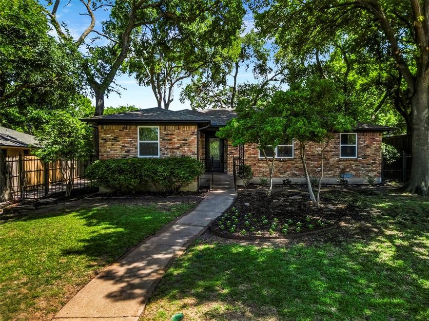 Come see this gorgeous, thoughtfully updated home just minutes from the beautiful Arboretum, White Rock Lake, and vibrant Downtown Dallas! This move-in-ready property offers an open floorplan with 3 bedrooms and 2 bathrooms, providing plenty of space for comfortable everyday living and entertaining. Enjoy a spacious living area plus a dedicated dining space perfect for gatherings.

Designer updates include laminate wood-like flooring throughout, new cabinetry and countertops, recessed lighting, modern fixtures, and stylish color selections. The living room features an eye-catching entertainment wall with a fireplace, creating a warm and inviting focal point.

Major system upgrades give buyers exceptional peace of mind, including a brand-new AC, new furnace, new water heater, new electrical panel, updated electrical, updated plumbing, and new windows—offering improved efficiency, comfort, and long-term value. A 2-car garage provides ample parking and storage. This home perfectly blends modern updates with a prime location and everyday convenience.