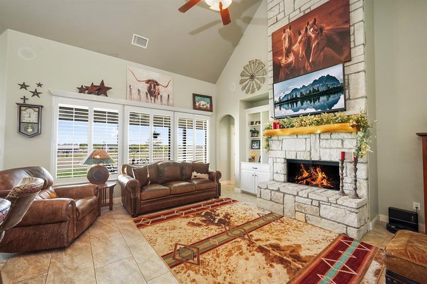 Use Preferred Lender to qualify for help with buyer’s closing costs, details in private remarks. Step into this magnificent 4-bedroom,3-bathroom home offering an impressive 2,847 sq ft of luxurious living space set on 2.13 picturesque acres Perfect for country enthusiasts alike this residence combines modern comfort with serene outdoor living. Enjoy the elegance of high ceilings with exposed beams and a striking white rock fireplace that soars to the cathedral ceiling in the living room, creating an inviting atmosphere for gatherings and relaxation. Experience culinary bliss in the beautifully updated kitchen featuring fresh white cabinetry with new hardware, new tile flooring, and generous counter space, making meal prep a breeze. Revel in the exquisite updates throughout including real hardwood floors in the entry hall, kitchen, dining area, and hallways. The spacious laundry room boasts a new granite countertop and sink, adding functionality to your daily routine. With a versatile upstairs game room and a dedicated office at the front, this home is designed for both work and play. Plus ,enjoy the built-in speaker system in the living area for your entertainment needs! The expansive backyard is your personal oasis, featuring a cozy fire pit, beautiful tree landscaping, and plenty of space for outdoor activities. Whether hosting friends or enjoying quiet evenings, this yard is a perfect retreat For horse lovers, the property includes a horse shed with hay storage, fenced areas for your animals, and a large shop with electricity for all your projects. A lean-to behind the shop provides additional storage and shelter options. Recent upgrades include a new AC unit, a new well house with sliding door access, and plantation shutters throughout, ensuring comfort and style year-round. Don’t Miss Out! This home is truly a rare find, offering a unique blend of modern amenities and tranquil country living. Schedule your private tour today!