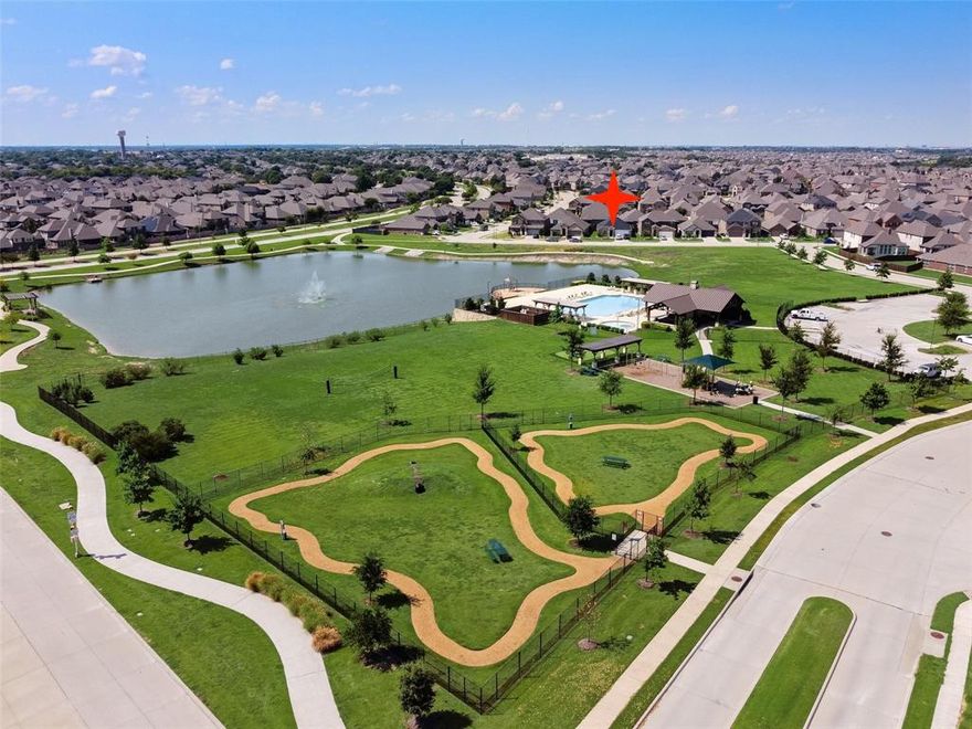 Ideally positioned within the desirable Woodcreek community of Fate, this single-story residence offers a prime setting directly across from the neighborhood lake and amenity center. Step inside to a thoughtfully curated floor plan that is perfect for both family living and entertaining, as it seamlessly connects the living, kitchen, and dining areas. At the heart of the home, the kitchen has everything a home chef could want - generous counter and cabinet space, a center island, and sleek stainless-steel appliances, including a gas range. The family room invites you to relax and make beautiful memories. The primary suite is tucked at the back of the home and has a lovely bath, making it a quiet retreat to unwind at the end of the day. The spacious fourth bedroom down the hall is versatile and can easily serve as a game or media room, a home office, or an additional bedroom - whatever fits your lifestyle best! Relax under the covered patio in the private backyard, with plenty of space for kids and pets to play. A brand-new roof means you’ll have peace of mind for years to come. Enjoy being just a short walk to the neighborhood amenities, including a lakeside pool with children's splash area, playground, dog park, sports field, and miles of scenic trails. Additional amenities include a clubhouse, fitness center, multiple pools, playgrounds, and parks. Elementary and middle schools are conveniently located within the community. Perfectly situated near I-30, this home offers easy access to nearby shops and dining, and historic downtown Fate, featuring a variety of restaurants, boutique shopping, and entertainment options.