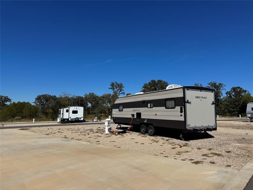 Escape to tranquility with this stunning, extraordinary, potentially once-in-a-lifetime chance to own an exclusive lake view lot nestled within the breathtaking Twin Lakes Resort in Mount Pleasant, Texas. Perfect for unforgettable weekend getaways or a brilliant investment, this one-of-a-kind retreat blends luxury and nature, offering an unparalleled opportunity. Owning this exclusive lake view lot grants you the rare privilege of enjoying Twin Lakes Resort’s stunning scenery and exceptional amenities: fishing, hiking, pickle ball, indoor and outdoor pools, basketball courts, general store, laundry facilities, shuffleboard, a splash pad, a playground, and serene lakefront vistas. Whether you seek relaxation or adventure, this RV lot is the ultimate sanctuary. The owner of this great lot can rent this out all year long if you wish for an excellent income opportunity! (Please not that this lot does not include an RV, it is the lot only.)