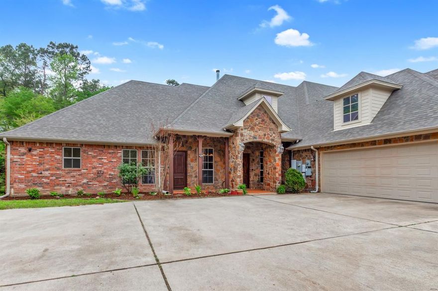 Welcome to an absolutely one-of-a-kind estate in Flint offering 4 bedrooms, 5.5 bathrooms, and a 3-car garage across 6,247 square feet, all set on expansive acreage. Tucked away in a private, serene setting, this home offers unmatched character while still being minutes from Tyler and Bullard. This home comes with a brand new composite roof and energy-efficient features like geothermal HVAC, 33kW solar panels, and propane backup systems.

Inside, a grand entry welcomes you with a stunning fireplace and intricate details throughout. The spacious kitchen features beautiful countertops, custom cabinetry, and opens to the main living area with another fireplace and backyard views. Additional features include central vacuum, wired audio, intercom, LED cove lighting, and video security.

A flexible office space and entertainment room with wet bar offer versatility, along with a dedicated gym and library.

The primary suite is a true retreat with direct sunroom access, while the ensuite bath offers ample space to unwind. The sunroom includes an outdoor kitchen and furnace for year-round use.

Bedrooms and bathrooms are generously sized, including a private suite with its own kitchen and exterior access—ideal for guests or multigenerational living. The home includes two wood and gas fireplaces and one gas-only.

Outside, enjoy agriculturally exempt acreage with chain-link and barbed wire fencing, a barn with tack room, and a private well for irrigation. A water softener and reverse osmosis system add convenience.

The garage includes two EV chargers, a Tesla Gateway, and storage rooms. Additional highlights include 5G+ internet, tankless propane water heaters, foam insulation, zoned geothermal heating, and tile flooring throughout.

This exceptional property offers space, efficiency, and privacy in a truly unique setting.

House and 20 acres for $1,700,000
House and 25.464 acres for $1,950,000
5.464 acres for $250,000
Contact listing agent for more info.