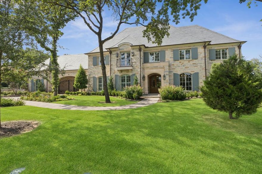 Majestic Private  Estate Home located in the ESTATES OF QUAIL HOLLOW! This meticulously designed 7,320 sq ft, 4-bedroom, 4.5-bathroom home is nestled on a private 1.5+ acre cul-de-sac homesite. This estate showcases serene pond views from your front door and a park-like setting in your backyard! Grande French doors invite you into an impressive foyer with gleaming floors, custom millwork, and a custom hand-forged iron chandelier. The gourmet kitchen showcases Taj Mahal honed quartzite double islands, Wolf 6-burner range with griddle and double ovens, SubZero refrigerator, Cove dishwasher, and adjacent bar with wine refrigerator and Scotsman ice maker. The great room features a dramatic floor to ceiling paneled wall with a 10-ft cast stone fireplace and chevron inlay, vaulted wood ceiling, and an abundant wall of glass windows and French sliding doors which offer spectacular views of this magnificent property. Retreat to the luxurious primary suite with diamond cut marble floors, Hollywood soaking tub, walk-in marble shower, two vanities, makeup bar, and two custom walk-in closets. Additional highlights include multiple game rooms with wood beam ceilings, premiere study with coffered ceiling and wood panel walls, home gym, extended covered patio with outdoor kitchen and gas grill, custom stone fireplace, sparkling pool and spa, sauna and more! Every exquisite detail reflects exceptional craftsmanship and designer finishes in this highly coveted 24-hour guard gated community!