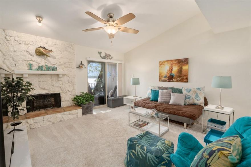 Welcome to this serene lakeside retreat in Gun Barrel City. This beautifully updated condominium offers breathtaking views of Cedar Creek Lake, creating the perfect escape from everyday living. Step inside to an inviting, modern interior featuring tasteful upgrades throughout. The recently renovated kitchen boasts granite countertops, stainless steel appliances, and a convenient breakfast bar, seamlessly opening to the main living area. A whitewashed stone fireplace serves as a charming focal point, adding warmth and character, while the dedicated dining area is ideal for entertaining. Enjoy peaceful lake views from the spacious private balcony—perfect for relaxing or hosting guests. Lifescape Condominiums provide an affordable, lock-and-leave lifestyle with desirable amenities, including a community pool for leisure and social gatherings. Ideally located near local marinas and boat storage facilities, this property offers easy access to a variety of water activities. Conveniently situated close to shopping and dining in Gun Barrel City and Mabank, and within the highly regarded Mabank ISD.